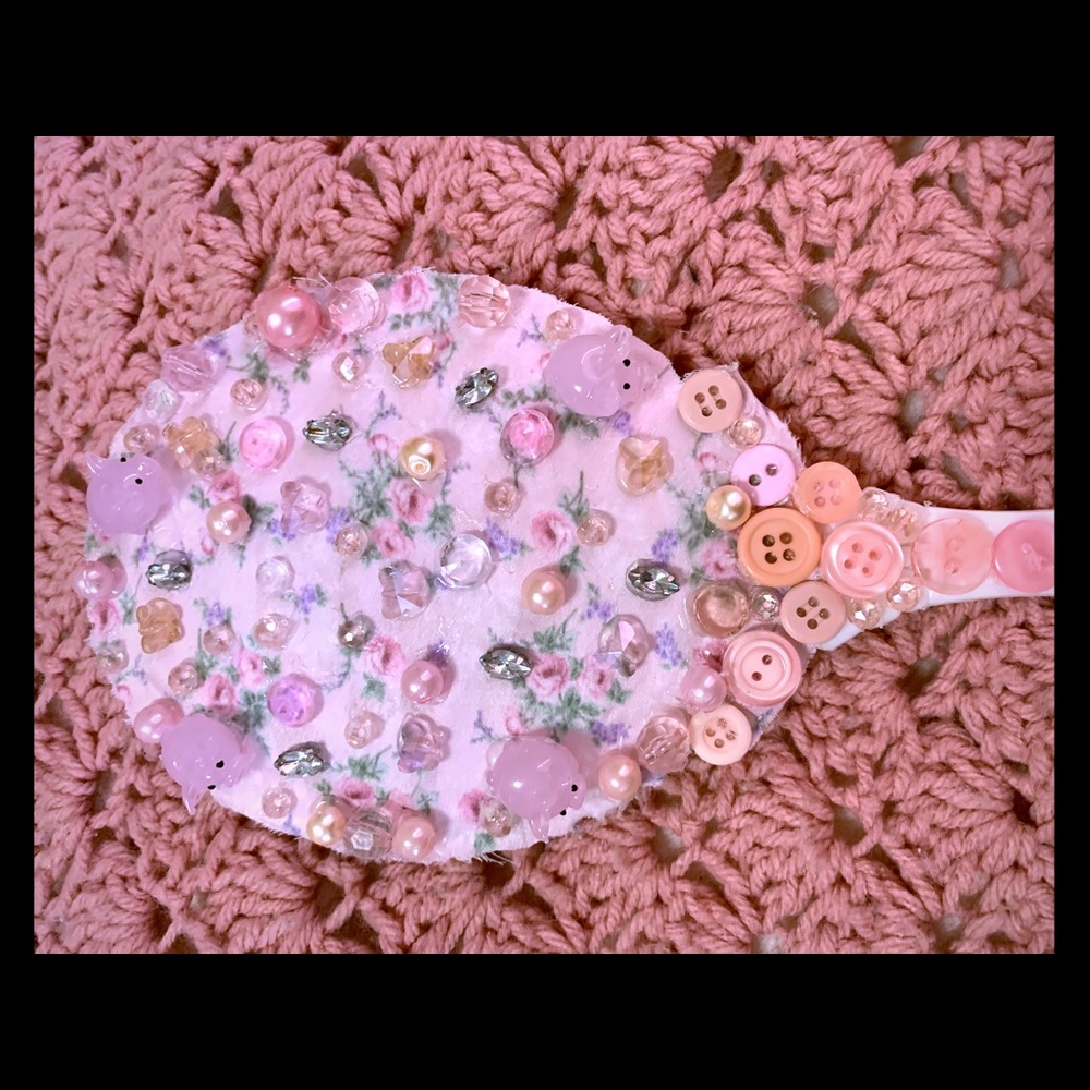 Hand held mirror